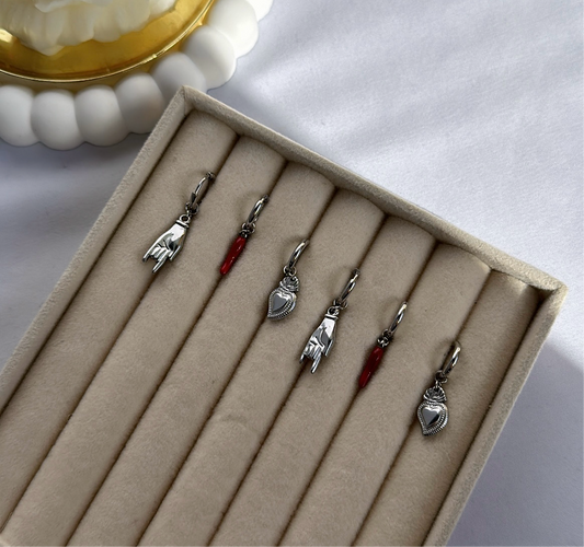 Set of earrings Sciò